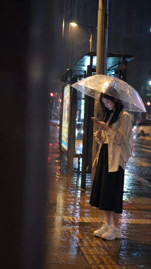 Cinematic rainy night bus stop prompt preview image 1