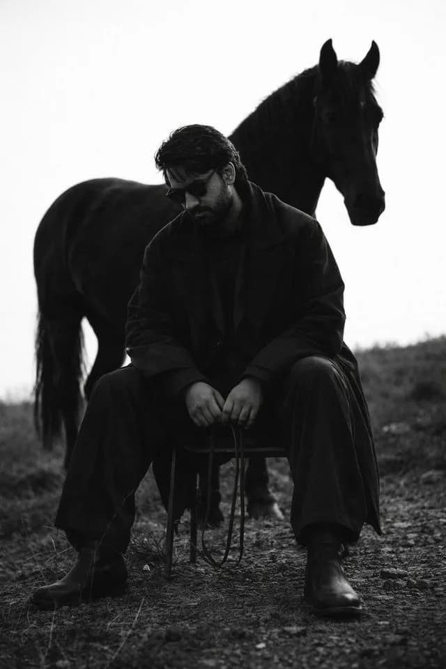 Cinematic Black and White Man and Horse Portrait preview image 1